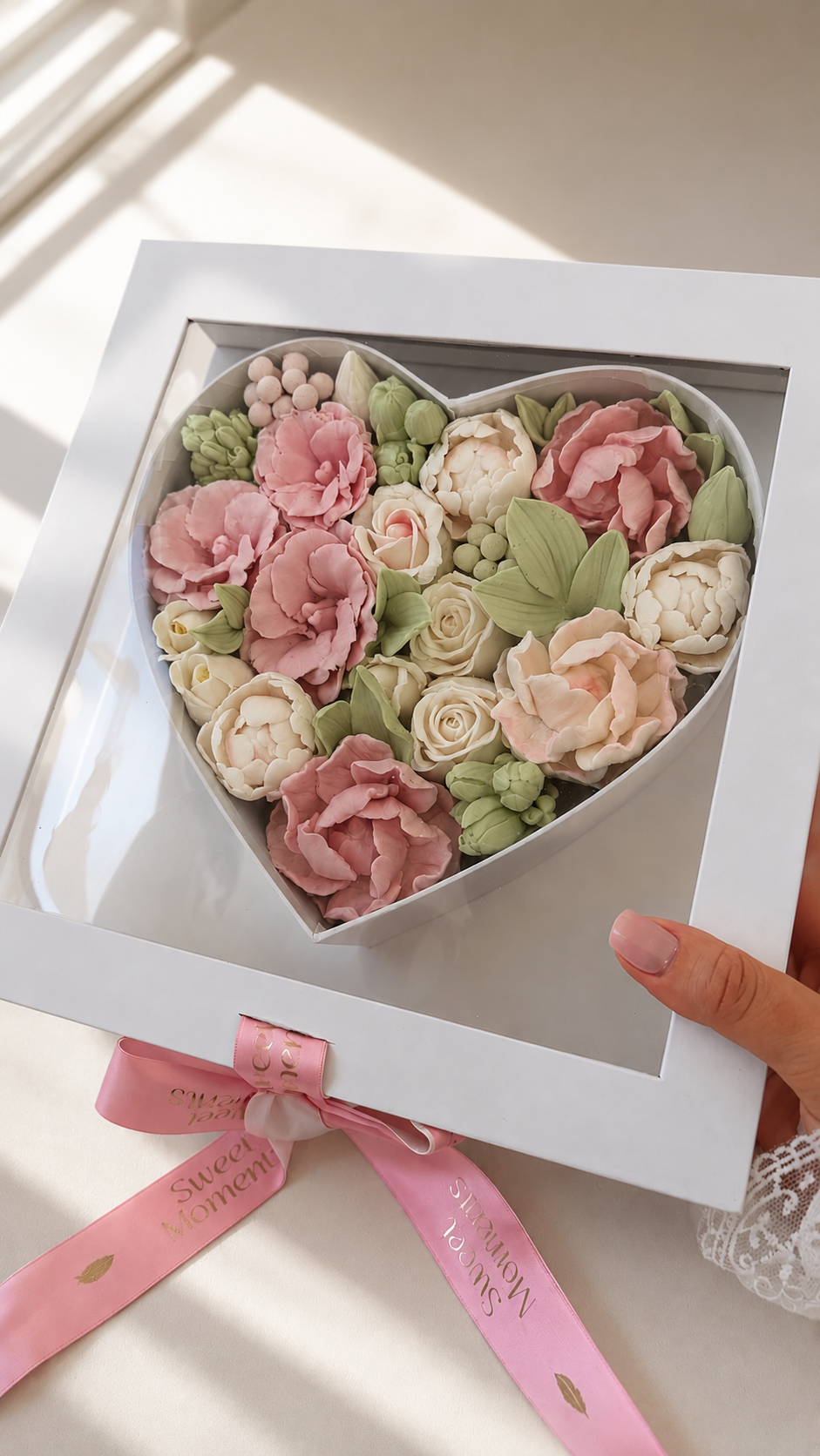 Zefir flowers arranged in a heart-shaped box